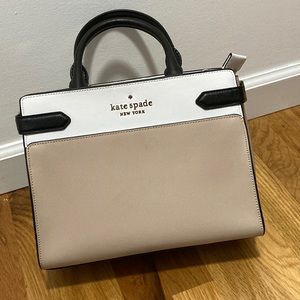 NEW UNUSED sleek Kate Spade handbag. Genuine leather. Gold accents - zipper/logo